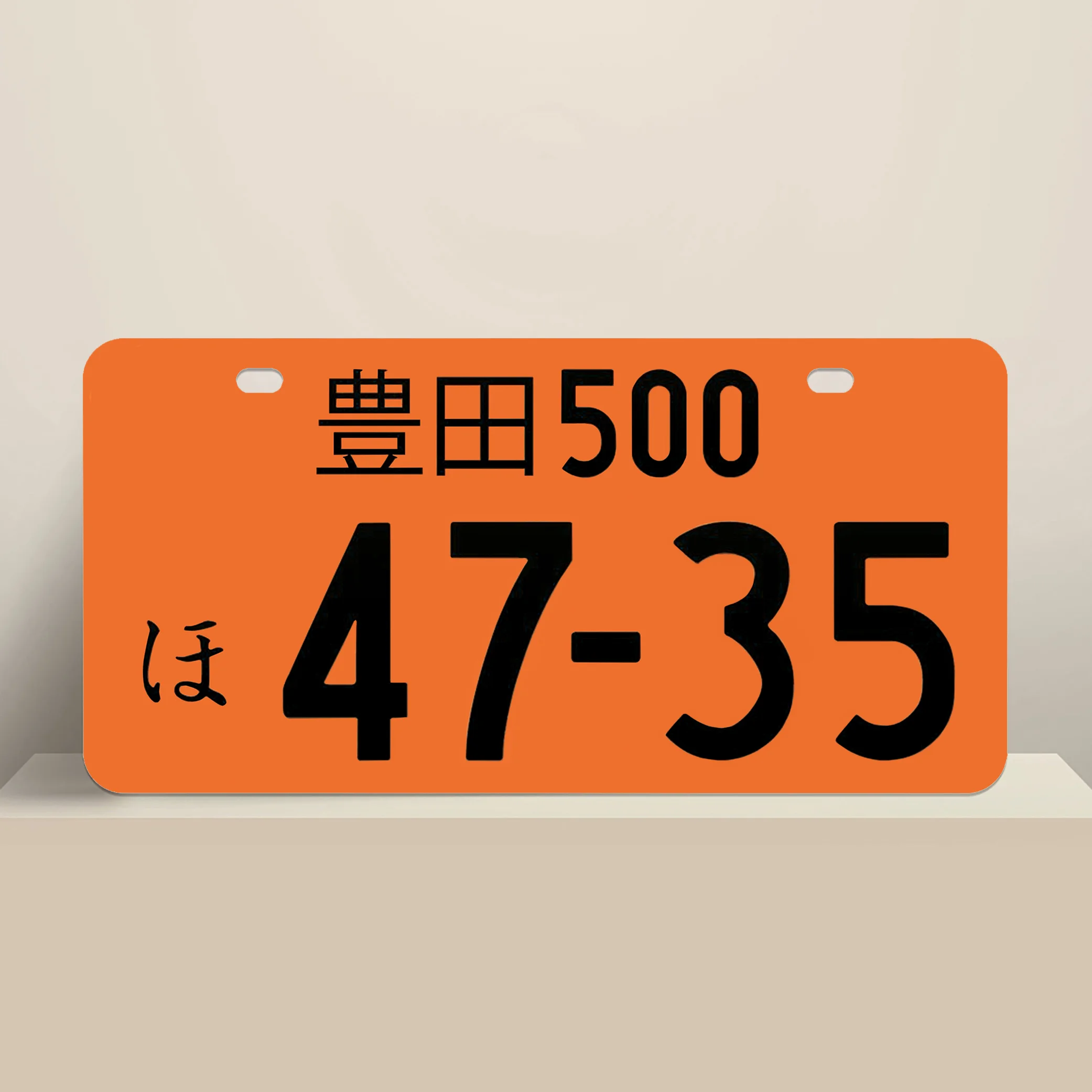Japanese Orange License Plate With Black Text